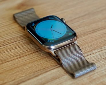 An image of an Apple Watch. The image is attached to an article that outlines how to enable prominent haptics on Apple Watch to adjust the vibration pattern.